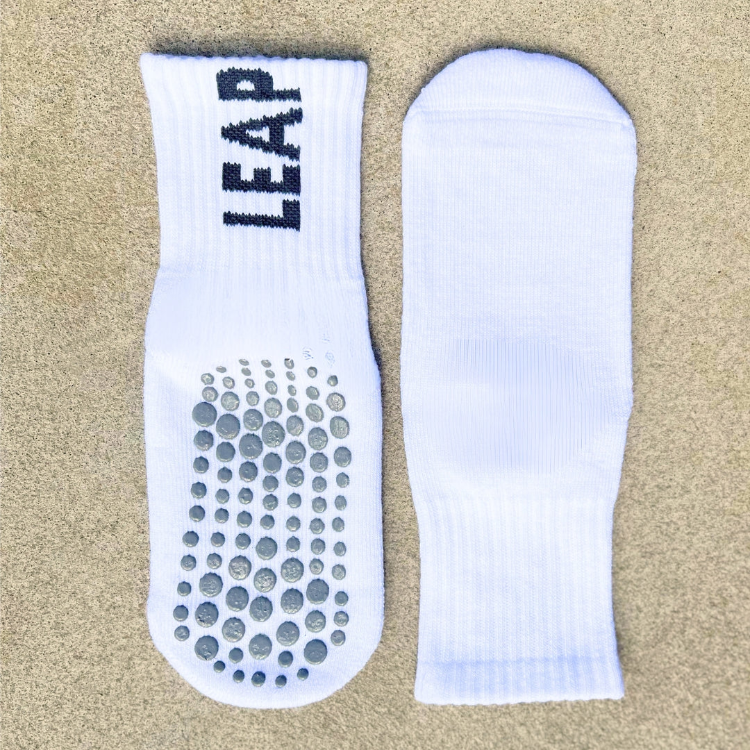 A front and bac view of Leap football grip socks.